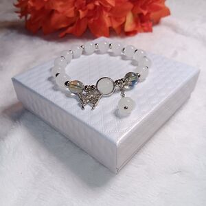 Elegant White Beaded Bracelet with Silver Butterfly Charm
